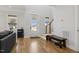 Inviting foyer with hardwood floors, staircase, and natural light streaming through the front door at 221 Old Hickory Dr, Raleigh, NC 27603