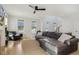 Cozy living room features hardwood floors, comfortable seating, and natural light at 221 Old Hickory Dr, Raleigh, NC 27603