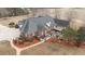 Brick house with detached garage, long driveway, and large backyard at 255 Dupree Rd, Willow Springs, NC 27592