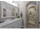 Bathroom with marble vanity and walk-in shower at 255 Dupree Rd, Willow Springs, NC 27592
