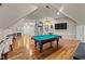 Spacious game room with pool table and home elevator at 255 Dupree Rd, Willow Springs, NC 27592