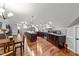 Open kitchen with island, granite counters, and hardwood floors at 255 Dupree Rd, Willow Springs, NC 27592