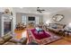 Spacious living room with hardwood floors, fireplace and seating area at 255 Dupree Rd, Willow Springs, NC 27592