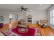 Living room with hardwood floors, fireplace, and comfortable seating at 255 Dupree Rd, Willow Springs, NC 27592