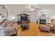 Bright living room featuring hardwood floors and a built-in entertainment center at 255 Dupree Rd, Willow Springs, NC 27592