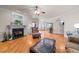 Spacious living room with hardwood floors and a cozy fireplace at 255 Dupree Rd, Willow Springs, NC 27592