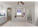 Main bathroom with a soaking tub, walk-in shower, and stained glass window at 255 Dupree Rd, Willow Springs, NC 27592