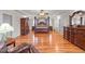 Main bedroom with hardwood floors and a large dresser at 255 Dupree Rd, Willow Springs, NC 27592