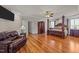 Large main bedroom with hardwood floors and a four-poster bed at 255 Dupree Rd, Willow Springs, NC 27592