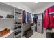 Spacious walk-in closet with shelving and a safe at 255 Dupree Rd, Willow Springs, NC 27592