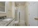 Bathroom with shower and granite vanity at 3124 Gross Ave, Wake Forest, NC 27587