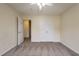 Bright bedroom featuring double doors and a ceiling fan at 3124 Gross Ave, Wake Forest, NC 27587