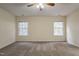 Bright bedroom with two windows and carpet at 3124 Gross Ave, Wake Forest, NC 27587