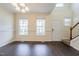 Spacious dining room with hardwood floors and a view of the front yard at 3124 Gross Ave, Wake Forest, NC 27587