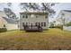 Two-story house with a backyard deck and lawn at 3124 Gross Ave, Wake Forest, NC 27587