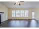 Living room featuring hardwood floors, fireplace and sliding glass door to deck at 3124 Gross Ave, Wake Forest, NC 27587
