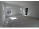 Spacious bedroom featuring two bright windows and awaiting final flooring at 3275 Roundly Rd # 10, New Hill, NC 27562