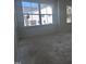 Bedroom with a large picture window providing backyard view at 3275 Roundly Rd # 10, New Hill, NC 27562
