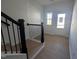 Inviting entryway showcases light hardwood floors and a brightly lit white door and window at 3275 Roundly Rd # 10, New Hill, NC 27562