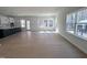 Open-concept living room offers spacious area with large windows providing abundant natural light at 3275 Roundly Rd # 10, New Hill, NC 27562