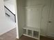 Convenient mudroom features built-in storage with hooks and shelving, perfect for organization at 3275 Roundly Rd # 10, New Hill, NC 27562