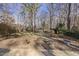 Wooded backyard with gazebo and shed at 4224 Sancroft Dr, Apex, NC 27539