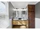 Modern bathroom with double vanity, large mirror, and white subway tile at 4224 Sancroft Dr, Apex, NC 27539