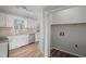 Spacious kitchen featuring stainless appliances and adjacent storage area at 4224 Sancroft Dr, Apex, NC 27539