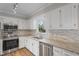 Kitchen with stainless appliances, granite countertops, and backsplash at 4224 Sancroft Dr, Apex, NC 27539