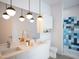 Spa-like bathroom with double vanity and blue tile shower at 507 Yancey St # 403, Durham, NC 27701