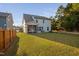 House with screened porch and grassy backyard at 5205 Doughtymews Ln, Fuquay Varina, NC 27526