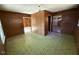 Open living space with wood paneling at 530 W King St, Hillsborough, NC 27278