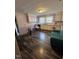 Open kitchen boasts natural light, ample counter space, and a cozy seating area at 614 Tucker St, Burlington, NC 27215