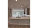 Open-concept kitchen with quartz island and stainless steel appliances at 65 Watermelon Dr, Franklinton, NC 27525