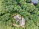 House nestled in a wooded, private lot at 6729 Greywalls Ln, Raleigh, NC 27614