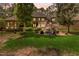 Spacious backyard with fire pit and seating area at 6729 Greywalls Ln, Raleigh, NC 27614