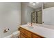 Clean bathroom with a modern vanity, large mirror, and walk-in shower at 6729 Greywalls Ln, Raleigh, NC 27614