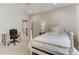 Bedroom with twin bed, desk, and built-in drawers at 6729 Greywalls Ln, Raleigh, NC 27614