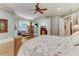 Bright bedroom with hardwood floors and sitting area at 6729 Greywalls Ln, Raleigh, NC 27614
