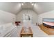 Bonus room featuring a seating area and access to other rooms at 6729 Greywalls Ln, Raleigh, NC 27614