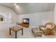 Bonus room with seating area and a view into another room at 6729 Greywalls Ln, Raleigh, NC 27614
