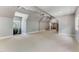 Large bonus room featuring multiple windows and carpet flooring at 6729 Greywalls Ln, Raleigh, NC 27614