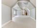 Spacious bonus room with high ceilings and carpet flooring at 6729 Greywalls Ln, Raleigh, NC 27614