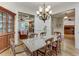 Spacious dining room with hardwood floors and view into Gathering room at 6729 Greywalls Ln, Raleigh, NC 27614