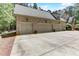 Three-car garage and spacious driveway at 6729 Greywalls Ln, Raleigh, NC 27614