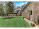Brick house with side yard and detached garage at 6729 Greywalls Ln, Raleigh, NC 27614