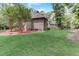 Brick house exterior showcasing a large yard at 6729 Greywalls Ln, Raleigh, NC 27614