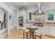 Modern kitchen with stainless steel appliances, granite countertops and hardwood floors at 6729 Greywalls Ln, Raleigh, NC 27614