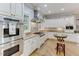 Well-equipped kitchen featuring stainless steel appliances and granite countertops at 6729 Greywalls Ln, Raleigh, NC 27614