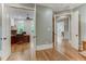 Home office with hardwood floors and built-in shelving at 6729 Greywalls Ln, Raleigh, NC 27614